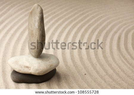 Meditation spa garden pattern of sand and stones with curved lines for balance and relaxation zen buddhism