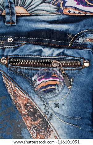 The zipper on the pocket of women\'s jeans