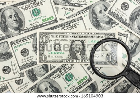 Look through a magnifying glass on the money, can be used as background