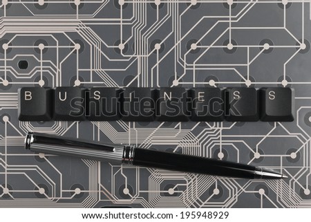 Keyboard keys laid out the word business on a black  background