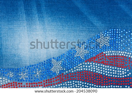 Multicolored rhinestones on denim, can be used as background