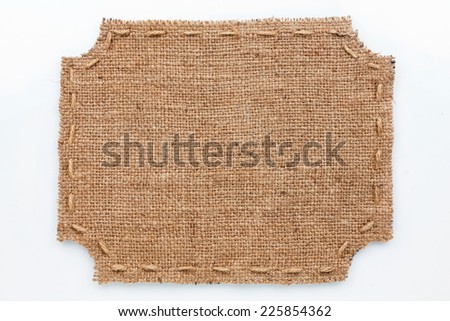 Frame of burlap, lies on a white background, can be used as texture