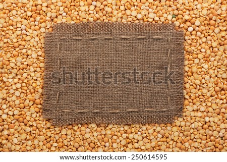 Frame made of burlap with the line lies on  peas seeds, with place for your text