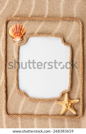 Two beautiful frame made of rope and sea shells with a white background, on the sand