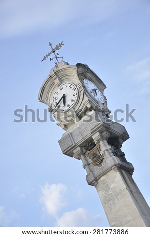 Detail of the stone clock which adorn the maritime walk  in San Sebastian, Spain