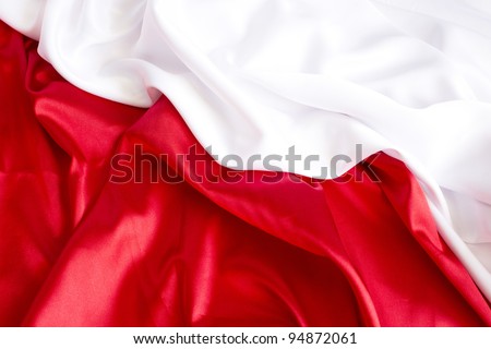red  and white background with a red and white satin