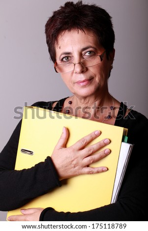 Woman hold documents in her hands