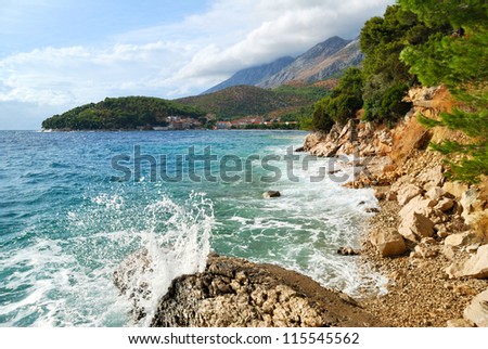 Sea Waves and Mountains in Clouds