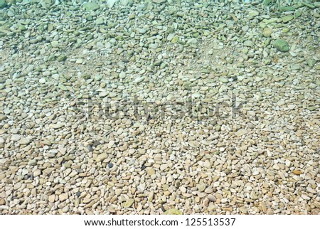 Sea bed with small pebbles underwater