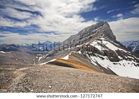 Big Sister - one of the Peaks of the Three Sister group of Mountains as seen from Canmore, Alberta, Canada. This is a view of the Big Sister Mountain as seen hiking down from the Middle Sister Summit.
