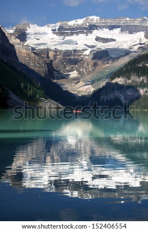 Mount Victoria, Lake Louise, Banff National Park, Alberta, Canada.   Canoeing on Lake Louise.