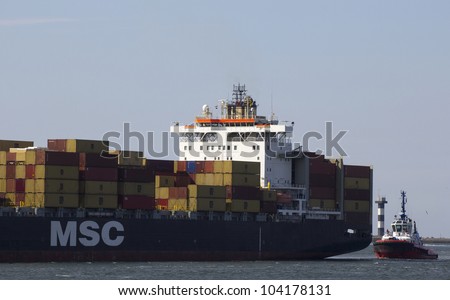 ROTTERDAM, THE NETHERLANDS - JUNE 2: Close-up of a containership, operated by a privately-owned company (MSC) engaged in worldwide container transport in Rotterdam on June 2, 2012