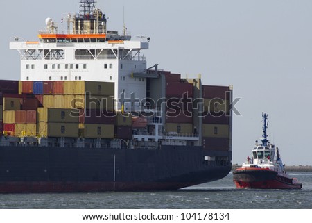 ROTTERDAM, THE NETHERLANDS - JUNE 2: Close-up of a containership, operated by a privately-owned company (MSC) engaged in worldwide container transport in Rotterdam on June 2, 2012