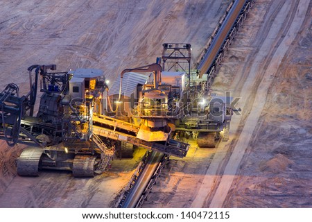 A large industrial conveyor-belt in a brown-coal mine