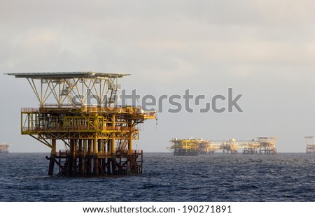 Oil rigs in an open sea