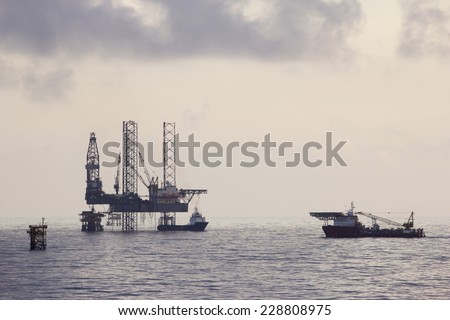 Oil rig and supply vessels