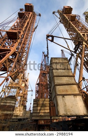 Cemetery of old elevating cranes