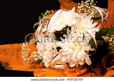 Beautiful bouquet flowers on a black background