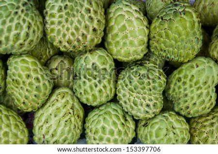 Custard apple background for sale at a market