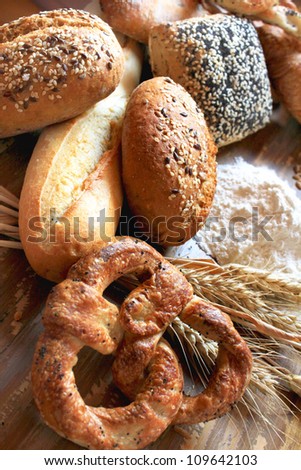 assortment of baked bread, with seeds or simple and pretzels
