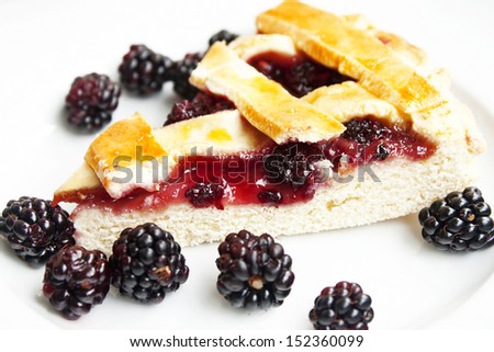 slice of homemade blackberry tart with blackberries, sweet dessert
