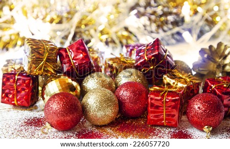 Christmas Golden and Red Decoration with Balls and Gifts Glittered