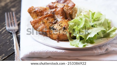 Roasted Spicy Chicken Breasts with Rice Garnish and Lettuce