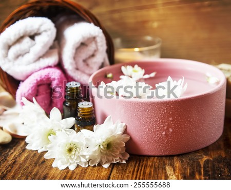 Natural Spa Setting and Treatment with Flowers and Essential Oils