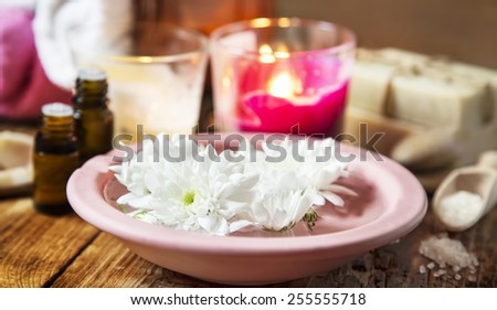 Natural Spa Setting and Treatment with Flowers and Essential Oils