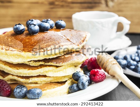 Breakfast Honey Pancakes with Blueberries,Raspberries and Coffee