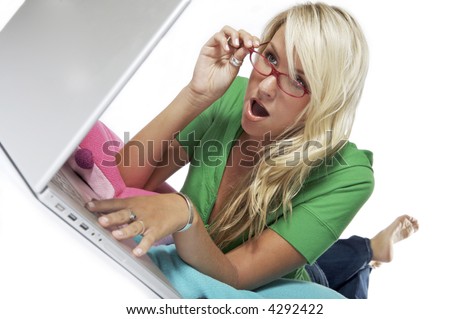 stock-photo-pretty-blond-girl-with-a-look-of-amazement-on-her-face-artistic-angle-4292422.jpg
