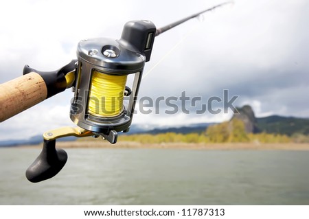 Salmon Fishing Pole Hanging  Out Over Water