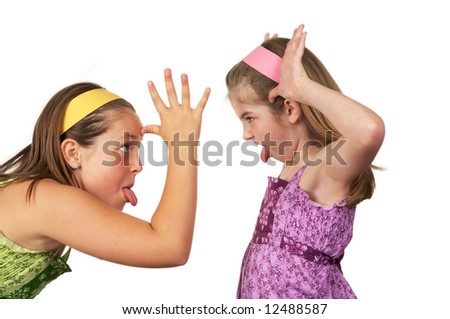 stock-photo-two-young-girls-fighting-and-sticking-their-tongues-out-at-each-other-12488587.jpg