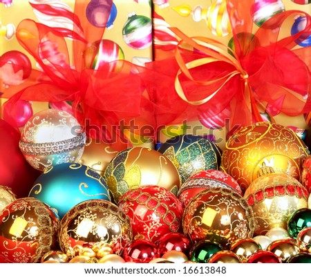 Colorful Christmas tree ornaments focus on the foreground, blurred background