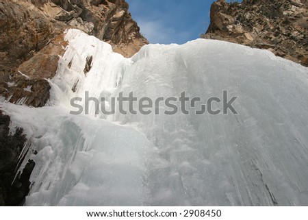 frozen waterfall brights on sun incident rays