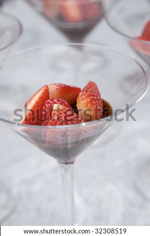 Strawberries and chocolate in martini glasses