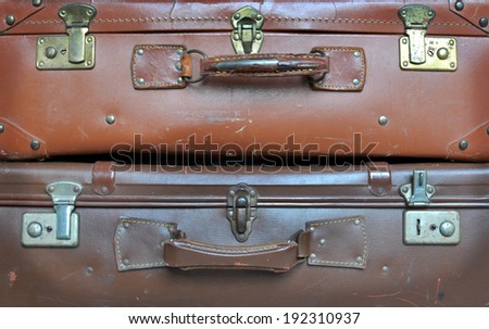 Old leather Vintage Suitcase - luggage stacked vertically