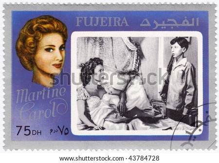 stock photo FUGEIRA CIRCA 1980 stamp with Martine Carol prominent 