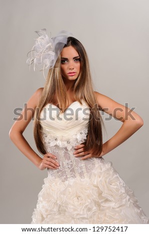 young bride dressed in elegance white wedding dress