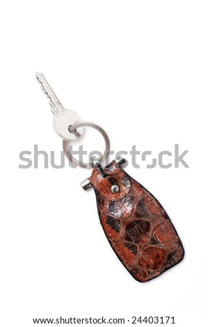 Leather key chain on white background
