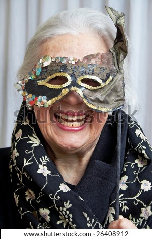 Smiling grandmother with mask