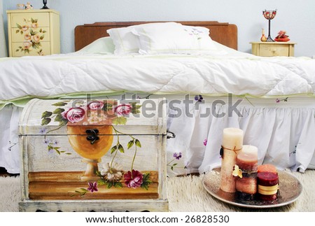 Bedroom with candles and old fashioned box