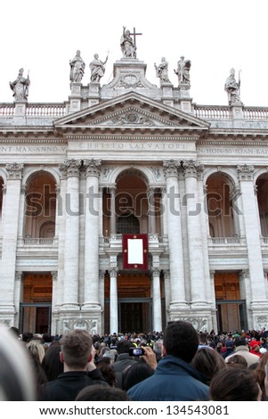 ROME, ITALY - April 07: People wait outside the Archbasilica of St. John Lateran for the settlement ceremony of Pope Francis I on April 07, 2013 in Rome.