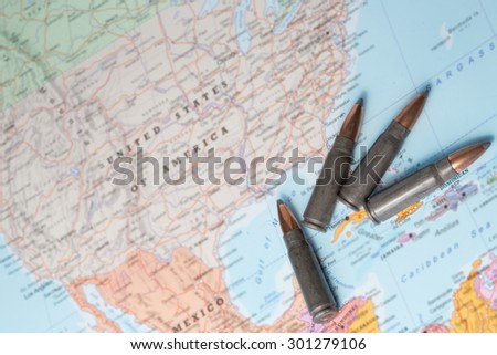 Four bullets on the geographical map of United States of America.