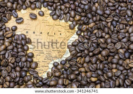 Vintage map of Brazil covered by a background of roasted coffee beans. This nation is the first main producer and exporter of coffee. Horizontal image.
