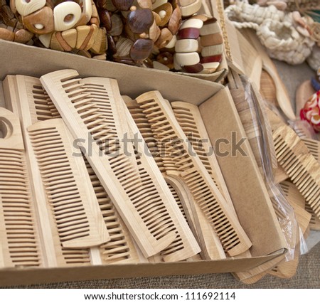 Combs, bracelets and other souvenirs made of wood from the Belarusian masters