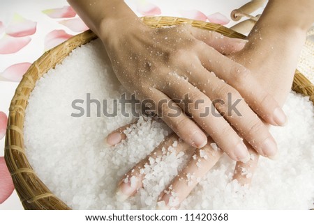 hands making beauty treatment the scrub with salt