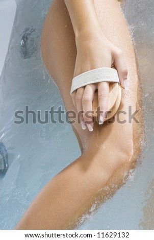 close up of woman body inside a bathtub in a therapeutic massage