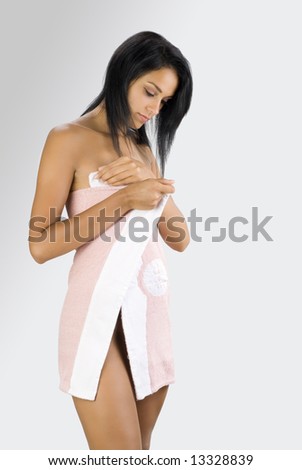 stock photo cute brunette with pink towel starting with her daily routine 