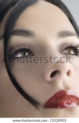 close up of a beautiful girl with o tuft of hair on her face